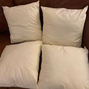 Set of 4 throw pillow forms.